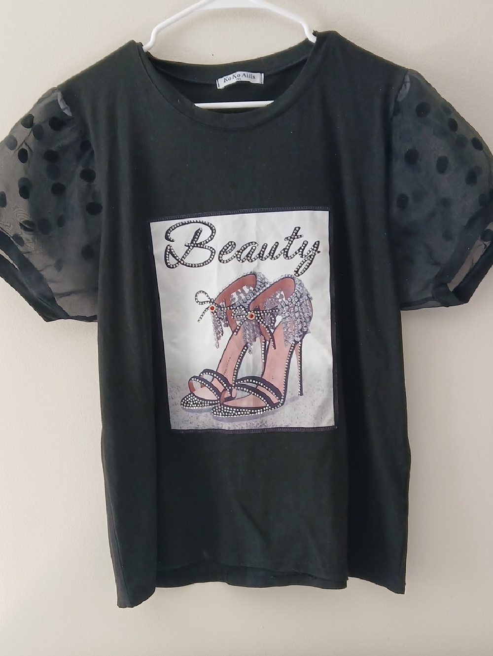 Black Tee with Sheer Polka Dot Puff Sleeves and 'Beauty' Graphic